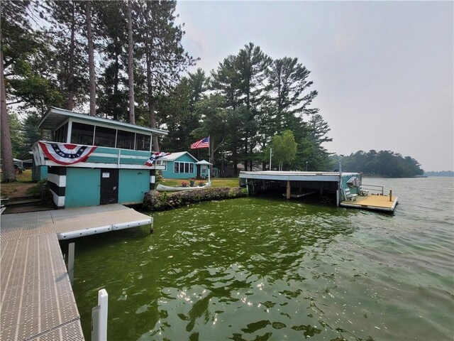 dock area with a water view