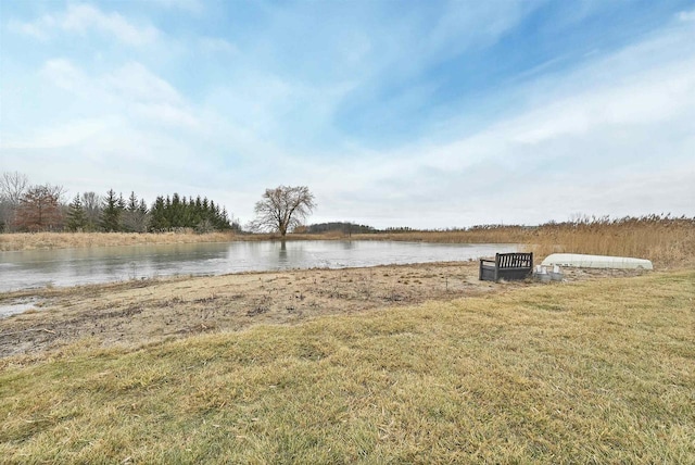 view of yard with a water view