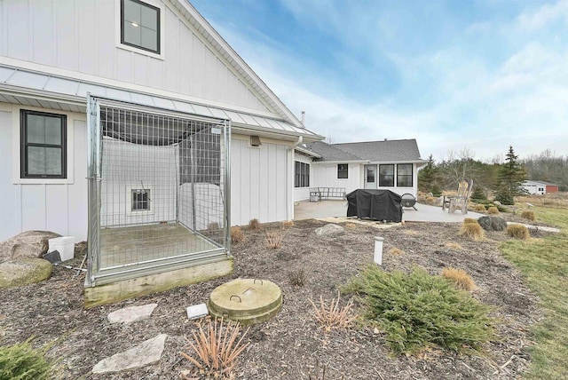 back of house featuring a patio area