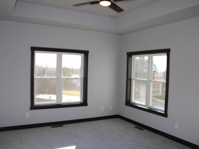 W4241 Hilltop Dr, Fond Du Lac, WI 54937 - carpeted empty room with a tray ceiling and ceiling fan