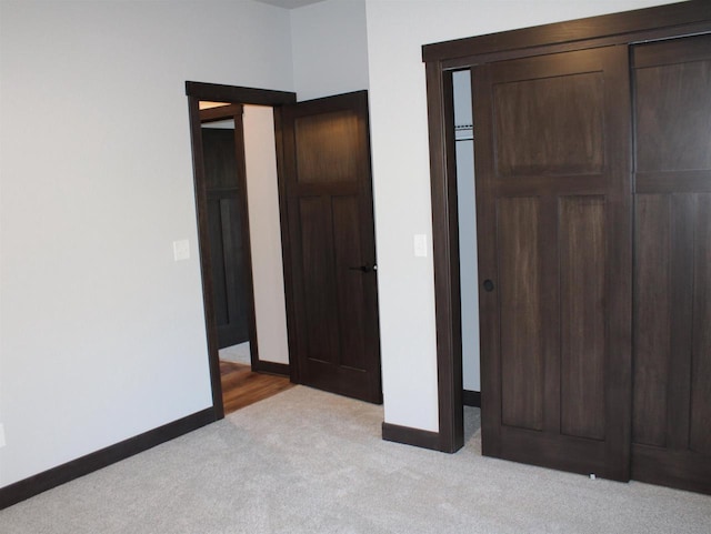 W4241 Hilltop Dr, Fond Du Lac, WI 54937 - unfurnished bedroom featuring light carpet and a closet
