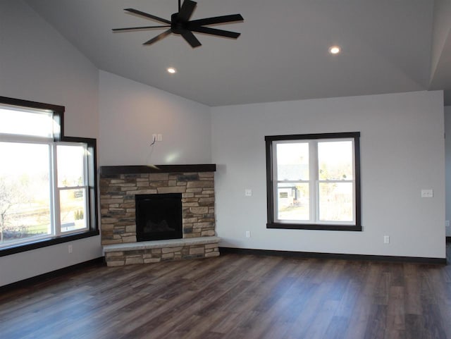 W4241 Hilltop Dr, Fond Du Lac, WI 54937 - unfurnished living room featuring a fireplace, ceiling fan, dark hardwood / wood-style flooring, and vaulted ceiling