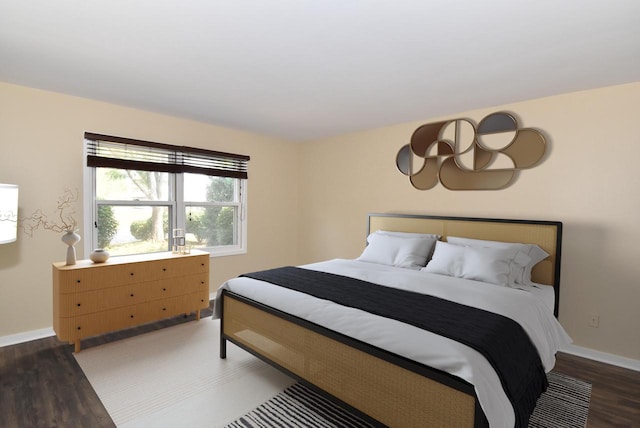 bedroom featuring wood-type flooring