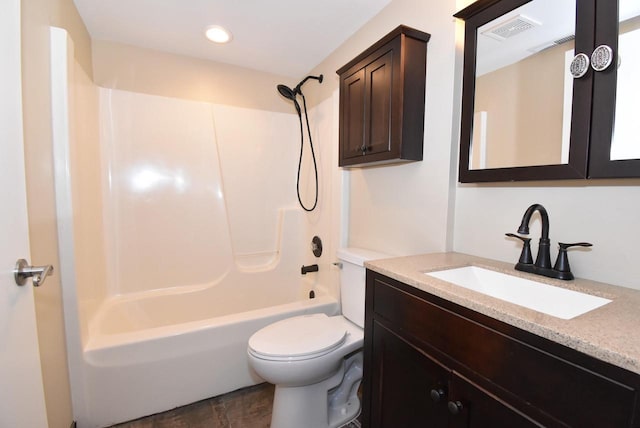 full bathroom with toilet, vanity, and washtub / shower combination