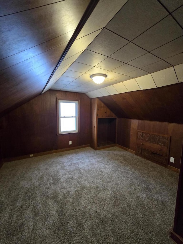 bonus room with carpet and lofted ceiling