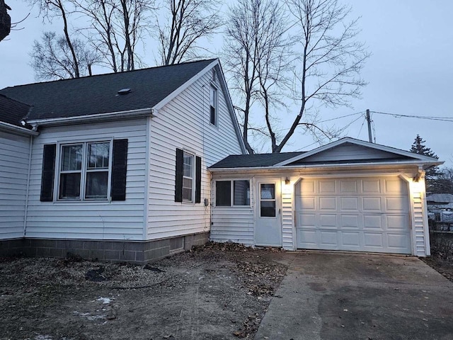 view of front of home with a garage