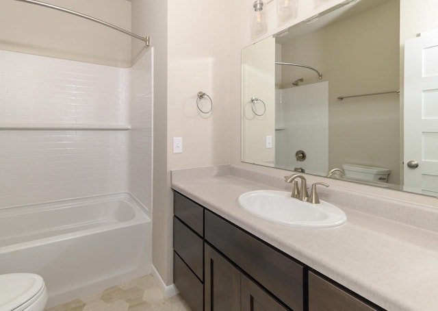 bathroom with vanity, toilet, and  shower combination