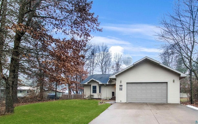 ranch-style house with a garage and a front lawn