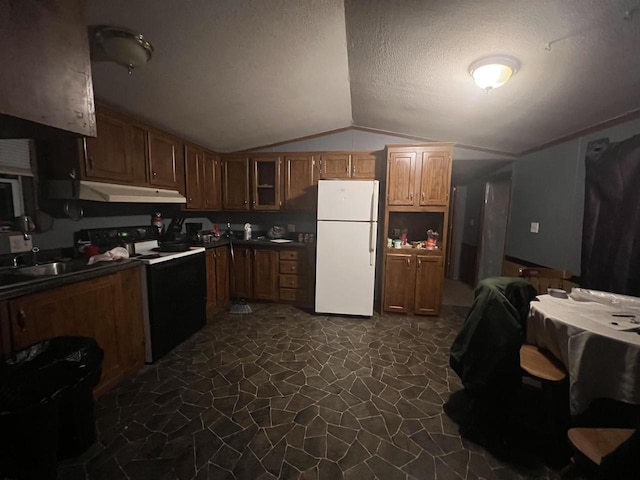 kitchen featuring lofted ceiling, white refrigerator, sink, electric range, and a textured ceiling