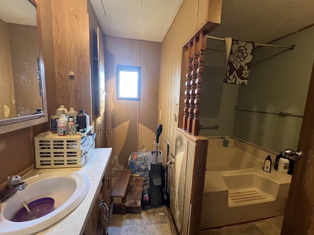 bathroom with vanity and independent shower and bath