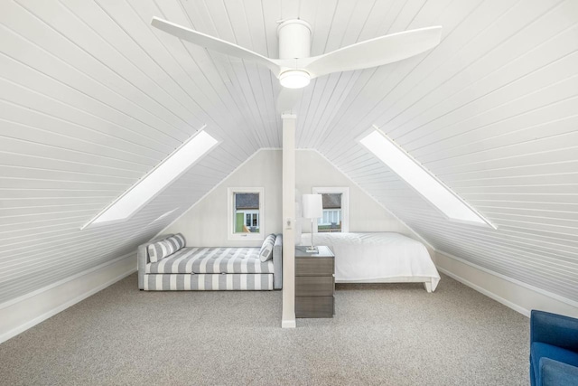 bedroom with carpet flooring, ceiling fan, and vaulted ceiling