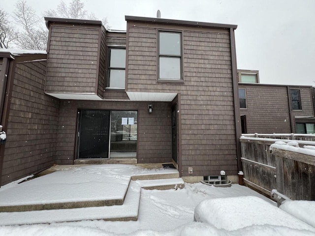 view of snow covered house