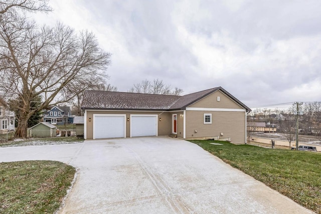 view of home's exterior with a yard and a garage