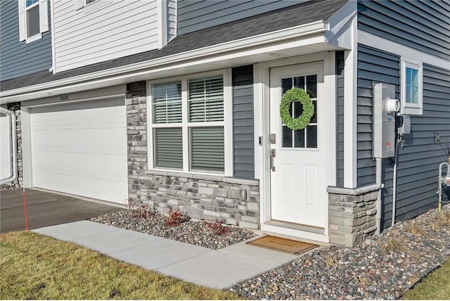 entrance to property with a garage