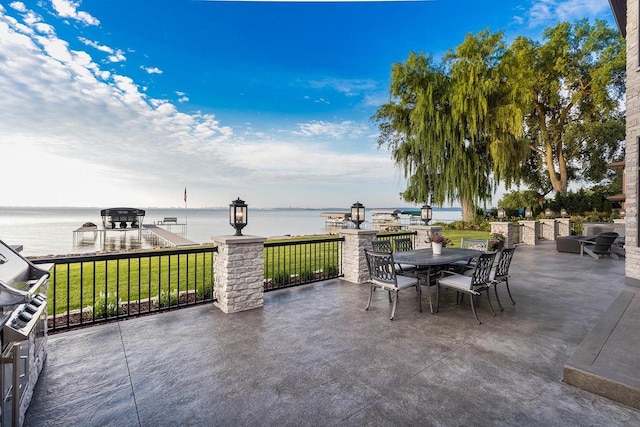 view of patio / terrace with a water view