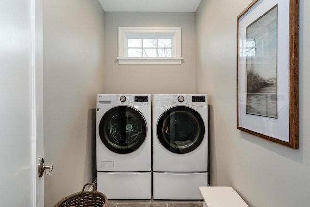 washroom featuring washing machine and dryer