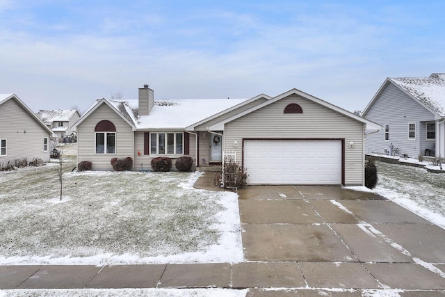 single story home with a garage