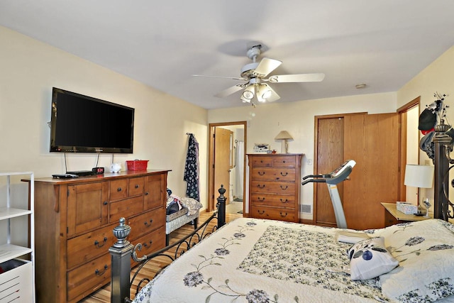 bedroom featuring ceiling fan and light hardwood / wood-style flooring