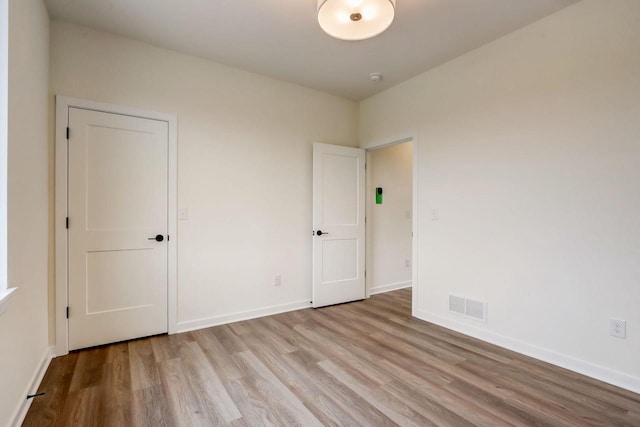 empty room featuring light wood-type flooring