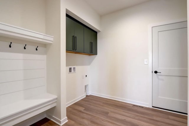 mudroom with light hardwood / wood-style floors