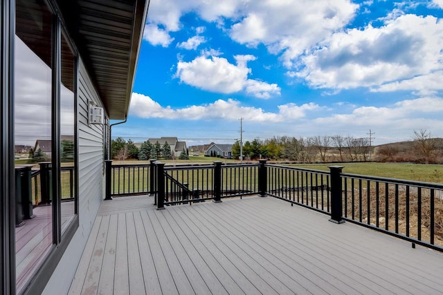 deck featuring a lawn