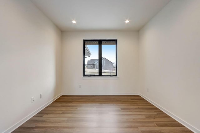 unfurnished room featuring light hardwood / wood-style flooring