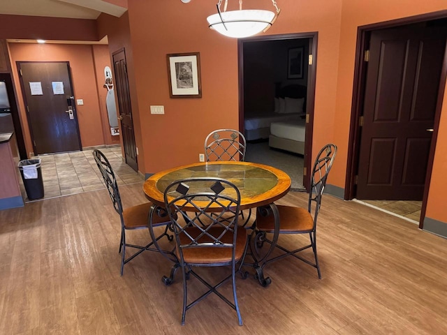 dining room featuring light hardwood / wood-style flooring