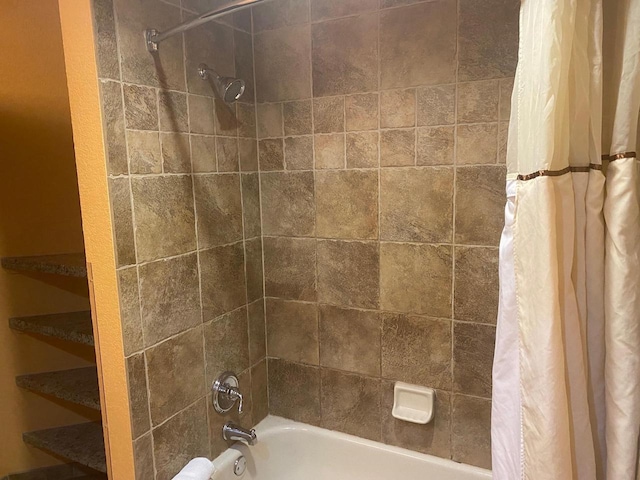 bathroom with shower / bath combo