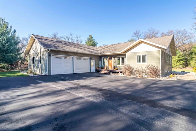 ranch-style home with a garage