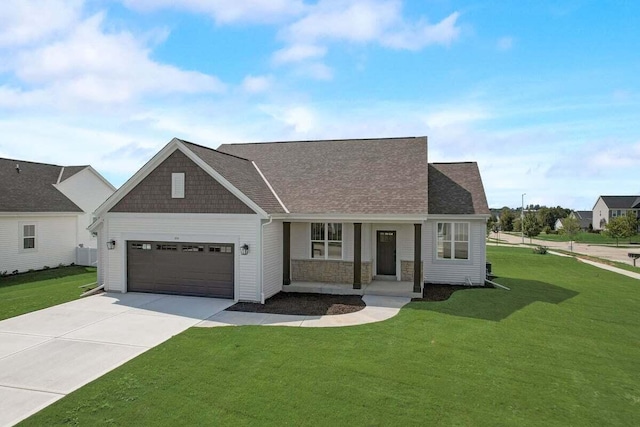 view of front facade with a garage and a front yard