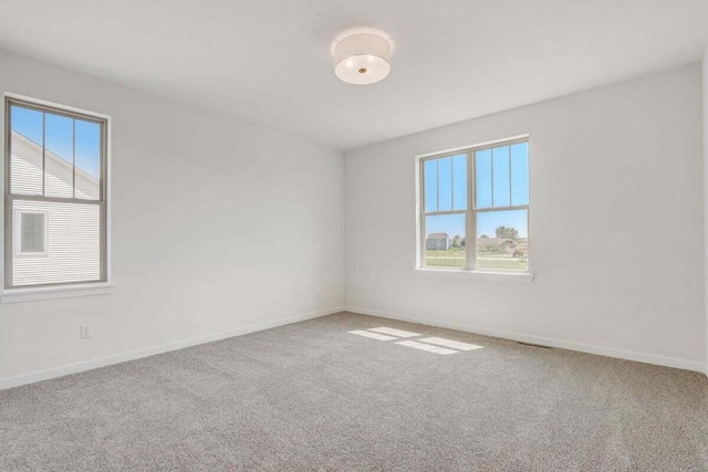 empty room with carpet floors