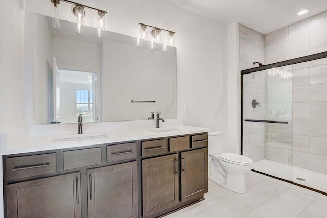 bathroom featuring walk in shower, tile patterned floors, vanity, and toilet