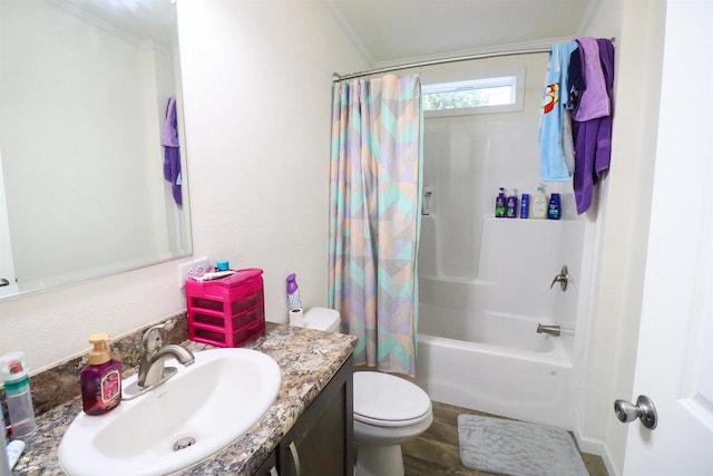 full bathroom featuring wood-type flooring, toilet, vanity, shower / tub combo, and ornamental molding