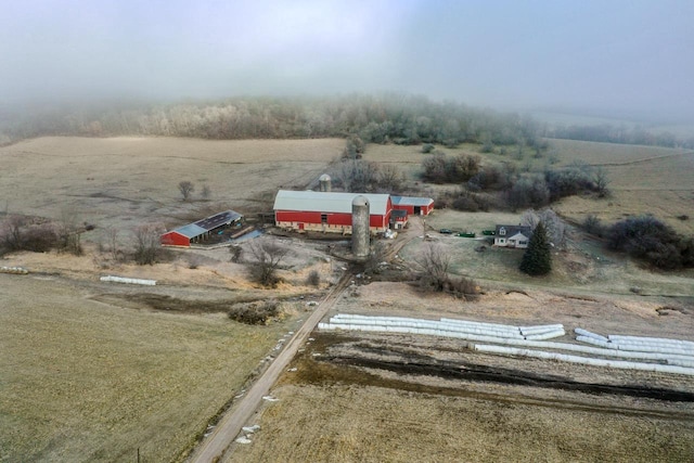 birds eye view of property featuring a rural view