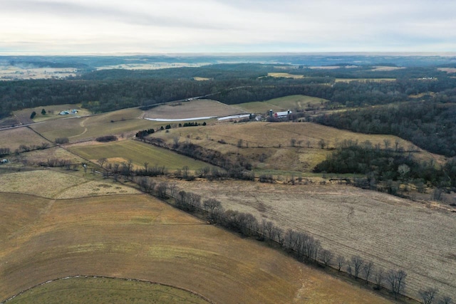 birds eye view of property featuring a rural view