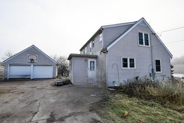 view of property exterior with a garage