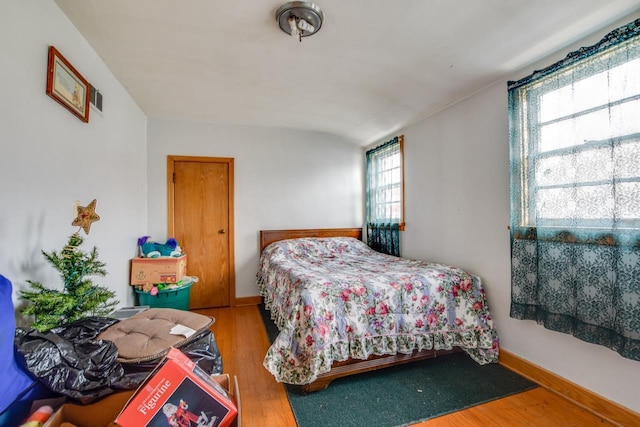 bedroom featuring hardwood / wood-style flooring