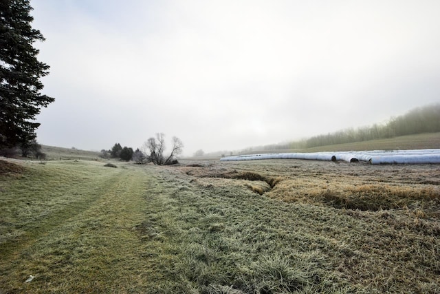 exterior space with a rural view