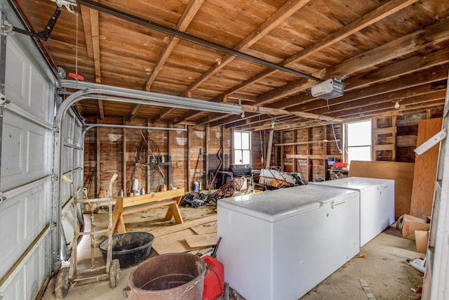 interior space featuring separate washer and dryer and a wealth of natural light