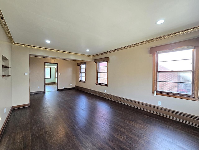 spare room with dark wood-type flooring