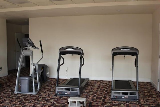 workout room with dark carpet