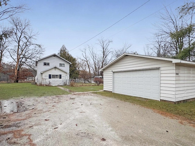 garage with a yard