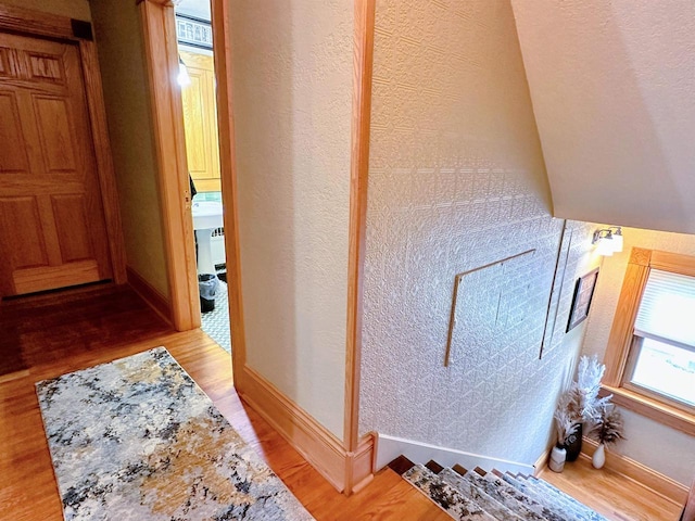 corridor featuring light hardwood / wood-style flooring