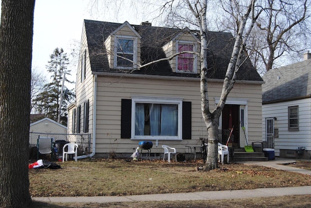 view of new england style home