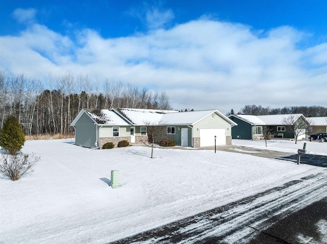 single story home with a garage