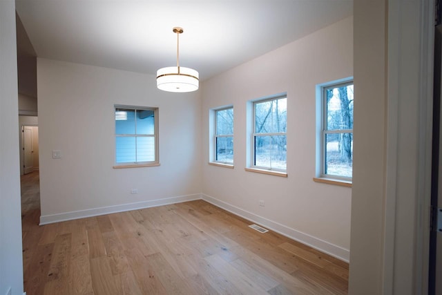 empty room with light wood-type flooring