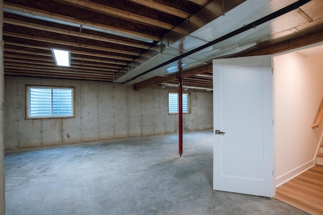 basement featuring plenty of natural light