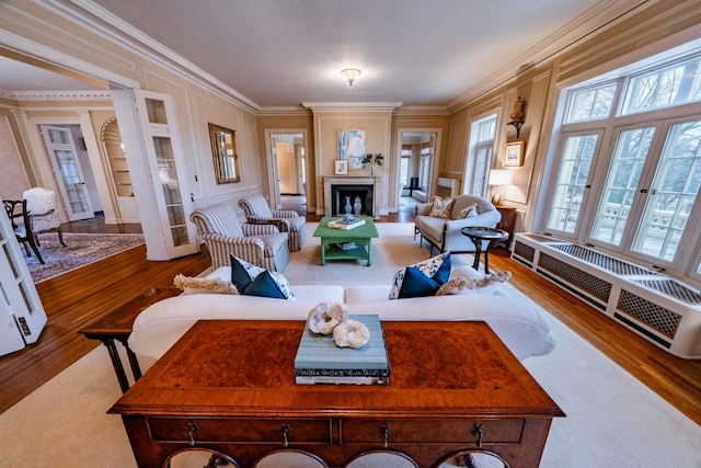 304 Braebourne Ct, Green Bay, WI 54301 - living room with french doors, hardwood / wood-style flooring, plenty of natural light, and ornamental molding