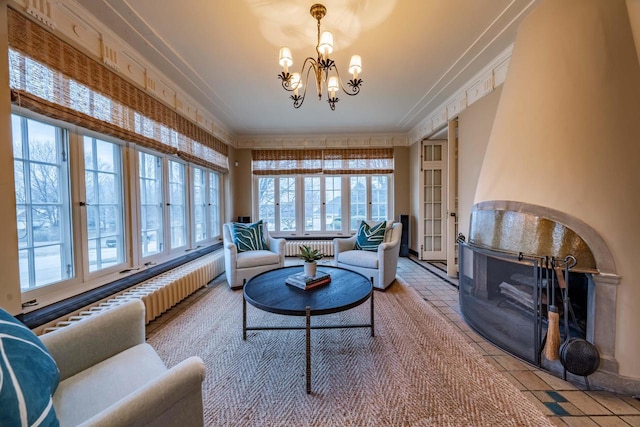 304 Braebourne Ct, Green Bay, WI 54301 - sitting room with radiator heating unit, tile patterned floors, a chandelier, a fireplace, and ornamental molding