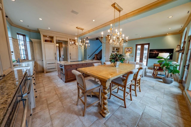 304 Braebourne Ct, Green Bay, WI 54301 - dining space featuring a notable chandelier, ornamental molding, sink, and french doors